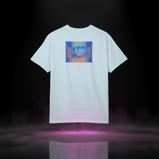 Back of Sixth Stitch Bloom Cipher Tee in Chambray featuring the Bloom Cipher graphic — a digital blue-orange flower with hidden sixes woven into the petals, glowing gradient background, and futuristic coded design elements.