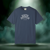 Sixth Stitch “Day One Tee” in midnight blue. Classic arched white “Sixth Stitch” text across the chest with “EST. 2025” printed below.