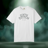Sixth Stitch “Day One Tee” in white. Classic arched white “Sixth Stitch” text across the chest with “EST. 2025” printed below.