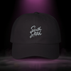 Sixth Stitch Drip Script Cap in black — streetwear dad hat with embroidered “Sixth Stitch” logo, premium cotton fit, urban camo design, part of the Quantum Stitch streetwear collection.