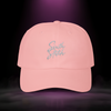 Sixth Stitch Drip Script Cap in pink — streetwear dad hat with embroidered “Sixth Stitch” logo, premium cotton fit, urban camo design, part of the Quantum Stitch streetwear collection.