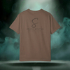 Back view of the First Impression Tee in espresso brown showing the large “S” script logo above the text “SIXTH STITCH – NEXT LEVEL APPAREL.”