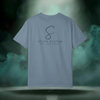 Back view of the First Impression Tee in ice blue showing the large “S” script logo above the text “SIXTH STITCH – NEXT LEVEL APPAREL.”