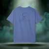 Back view of the First Impression Tee in mystic blue showing the large “S” script logo above the text “SIXTH STITCH – NEXT LEVEL APPAREL.”