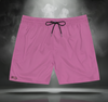 Sixth Stitch Keyed Up Trunks in neon pink with black drawstring, featuring the signature key emblem printed on the lower right leg.