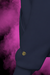 Closeup of sleeve cuff on Sixth Stitch Mind Rose Hoodie in navy displaying subtle embroidered gold “circle 6” insignia near wrist.