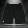 Pocket Theory Shorts front view — black streetwear shorts with white “Circle S” Sixth Stitch logo on the leg, minimalist athletic design with premium material and relaxed fit.