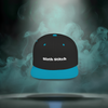 Front of Sixth Stitch Static Stitch Snapback with black crown and teal blue bill, featuring bold embroidered “Sixth Stitch” logo across the front. Structured flat-bill cap with snapback closure.