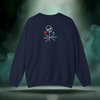 Back of Sixth Stitch Stitch and Bones Sweater in navy blue featuring stylized skull and cross-needle graphic with “sixth stitch” text integrated into design. Represents coded rebellion and unity through the stitch.